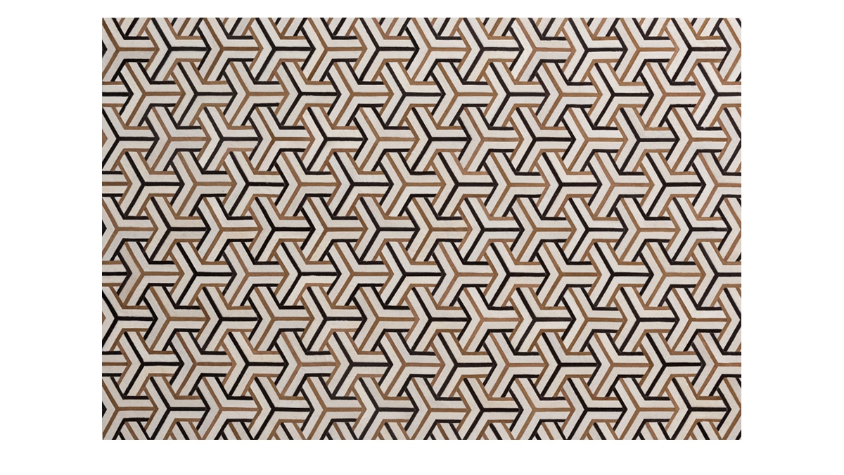 Patchwork cowhide rugs in custom natural and dyed colors