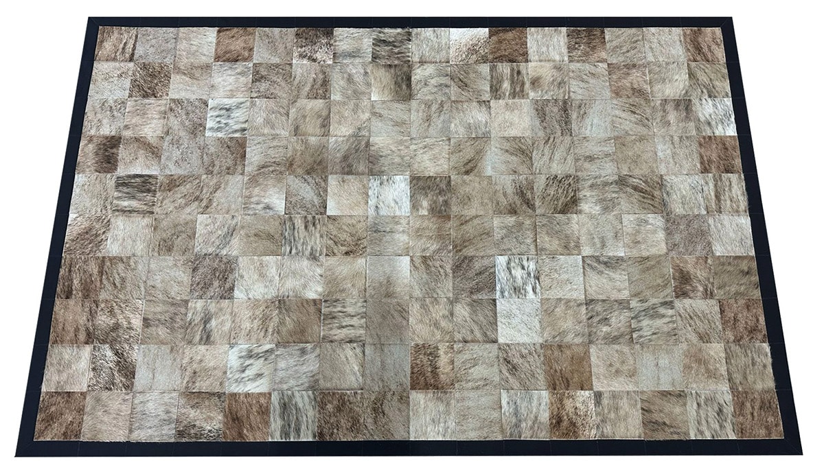 Light Brindle hide rug combines creams, greys and beige mixed natural colors