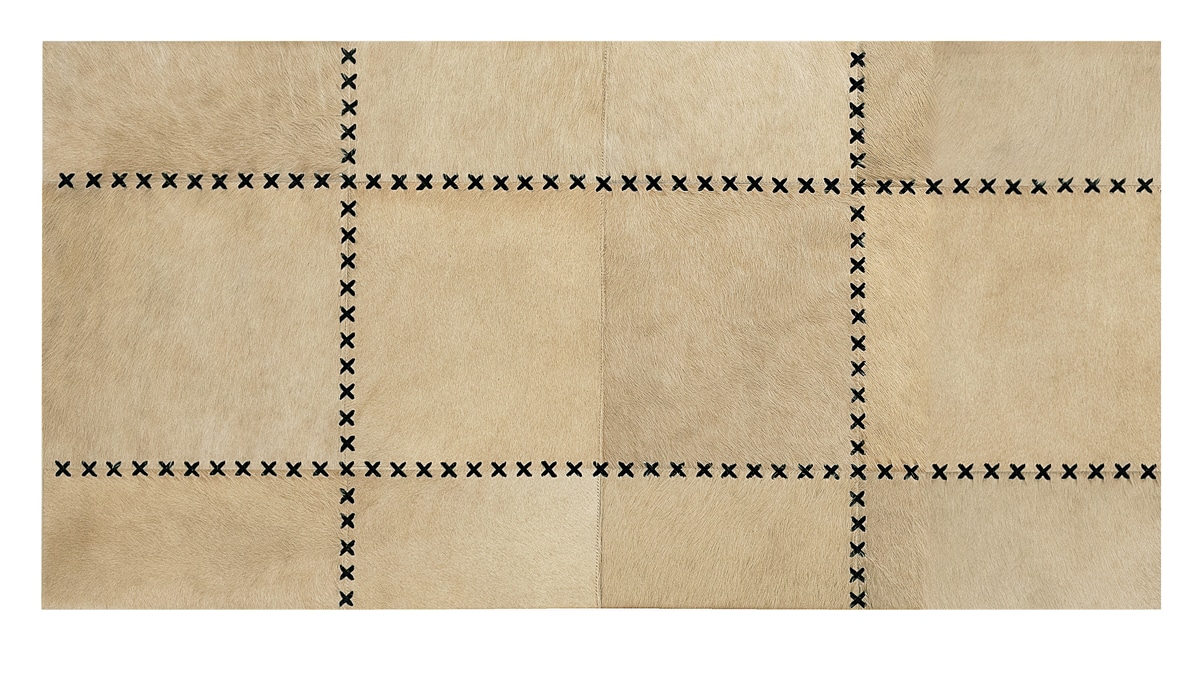 Tiento Cowhide Patchwork Rug in Large Patches with Tiento finishes