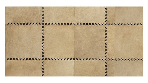 Tiento Cowhide Patchwork Rug in Large Patches with Tiento finishes
