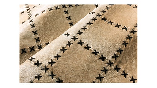 Light Beige Tiento Cowhide Patchwork Rug with Tiento Leather finishes