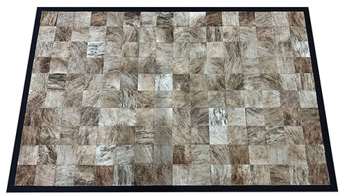 Light Brindle hide rug combines creams, greys and beige mixed natural colors